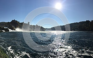 Beautiful waterfall Ã¢â¬ËReinfallÃ¢â¬â¢ with sun light, Newzealand photo